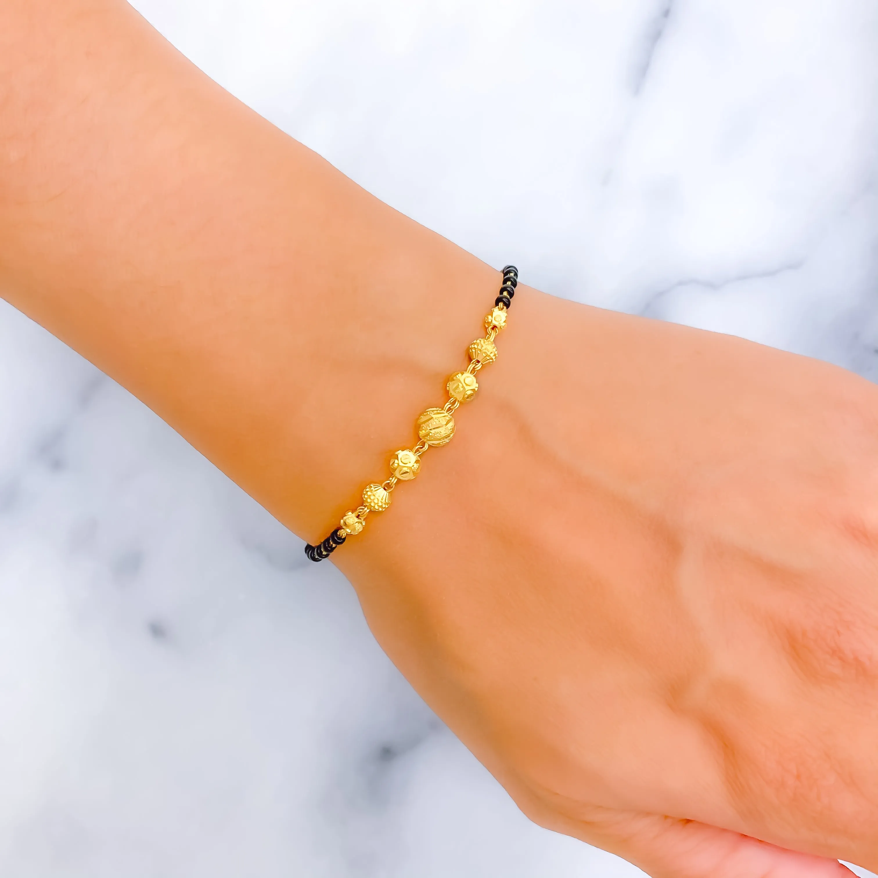 Tasteful Exclusive 22k Gold Black Bead Bracelet