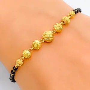 Tasteful Exclusive 22k Gold Black Bead Bracelet