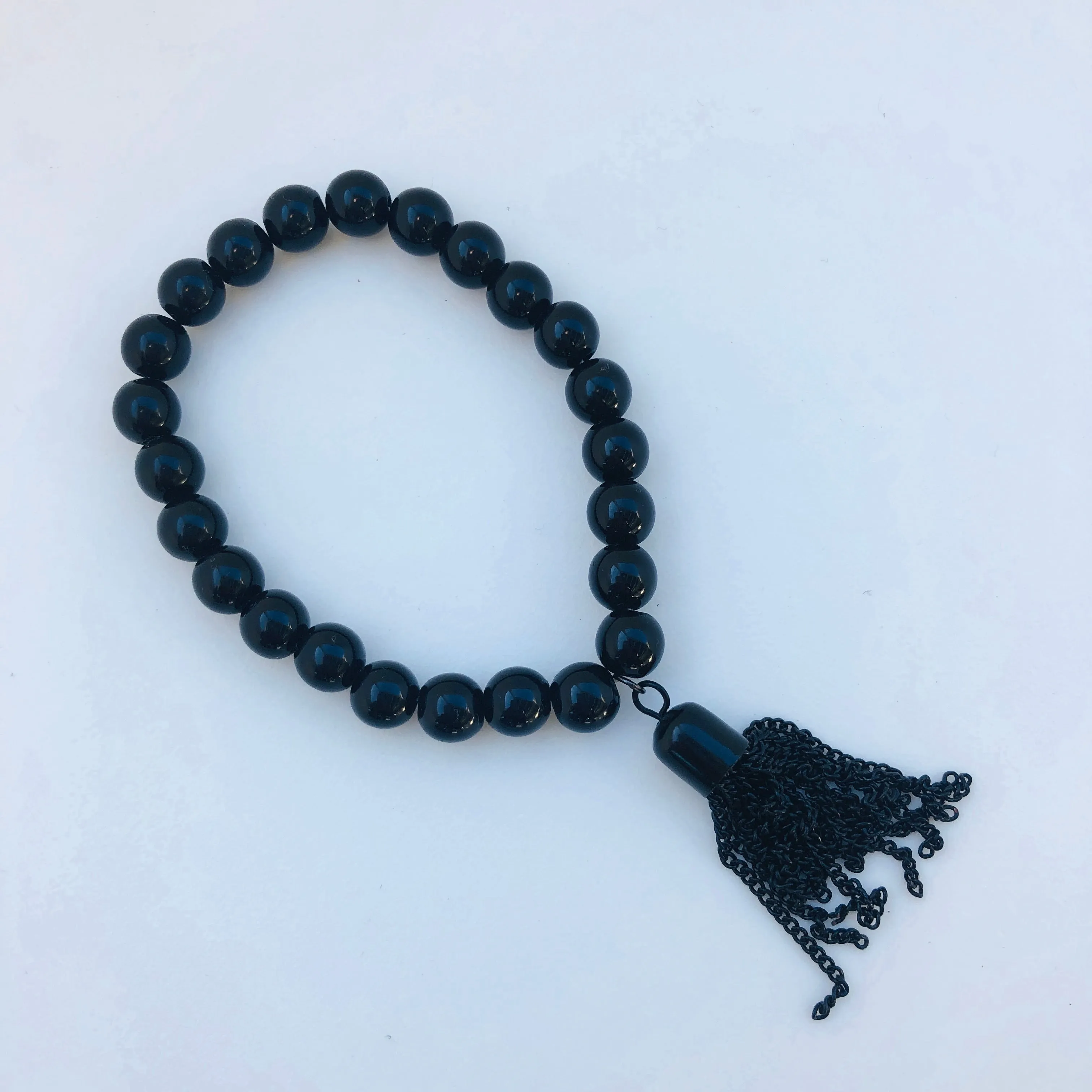 TM. 3 Piece Bead & Metal Tassel Bracelet