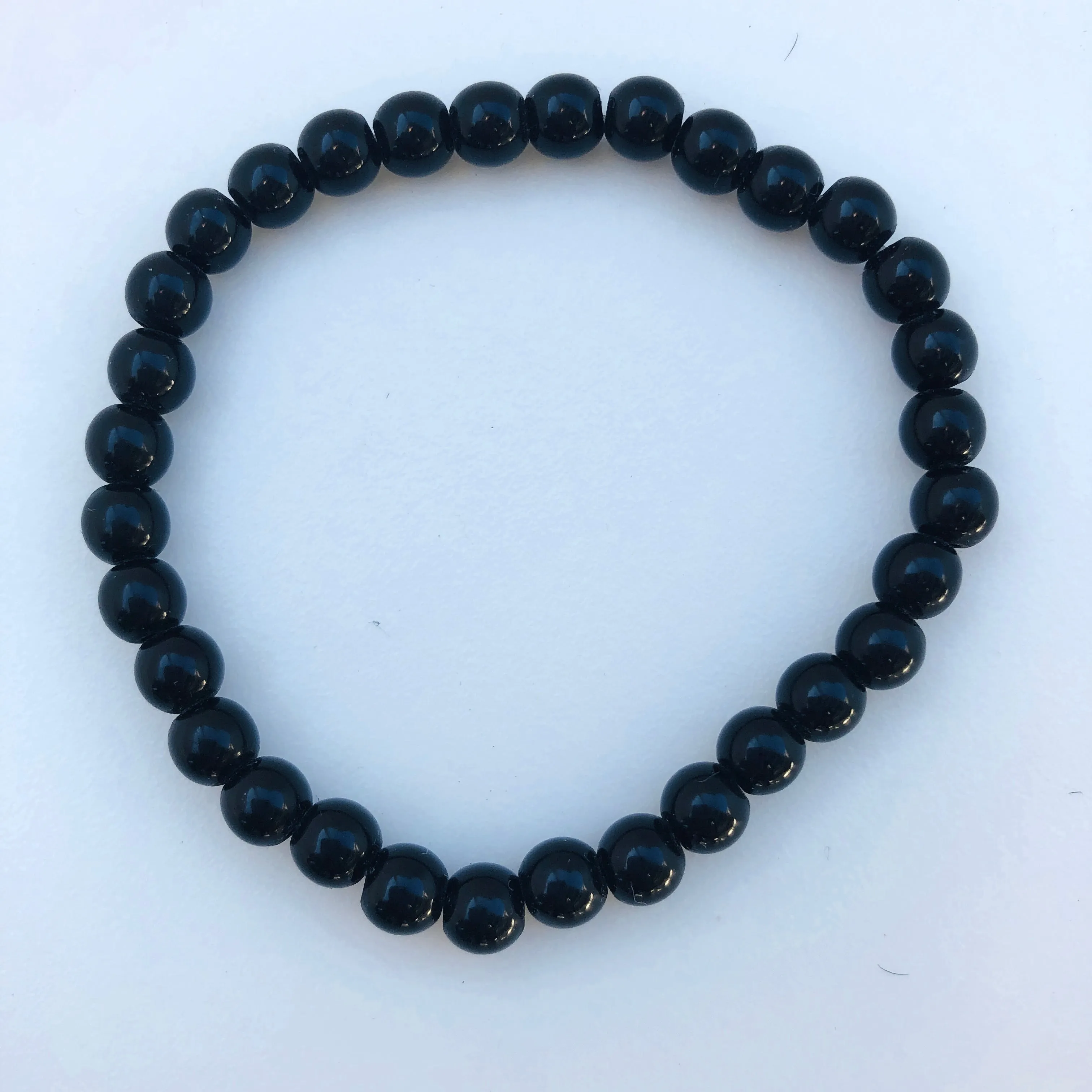 TM. 3 Piece Bead & Metal Tassel Bracelet