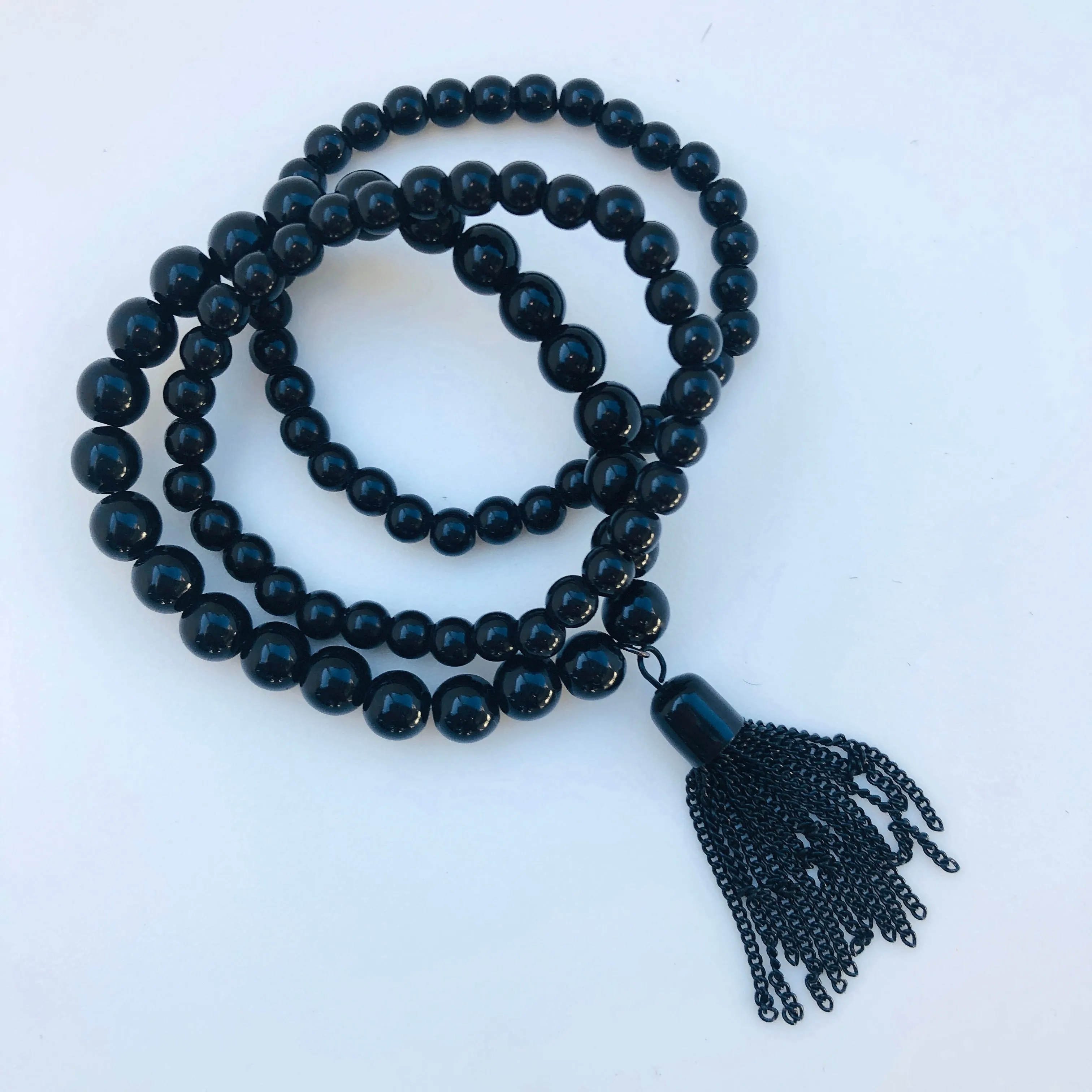 TM. 3 Piece Bead & Metal Tassel Bracelet